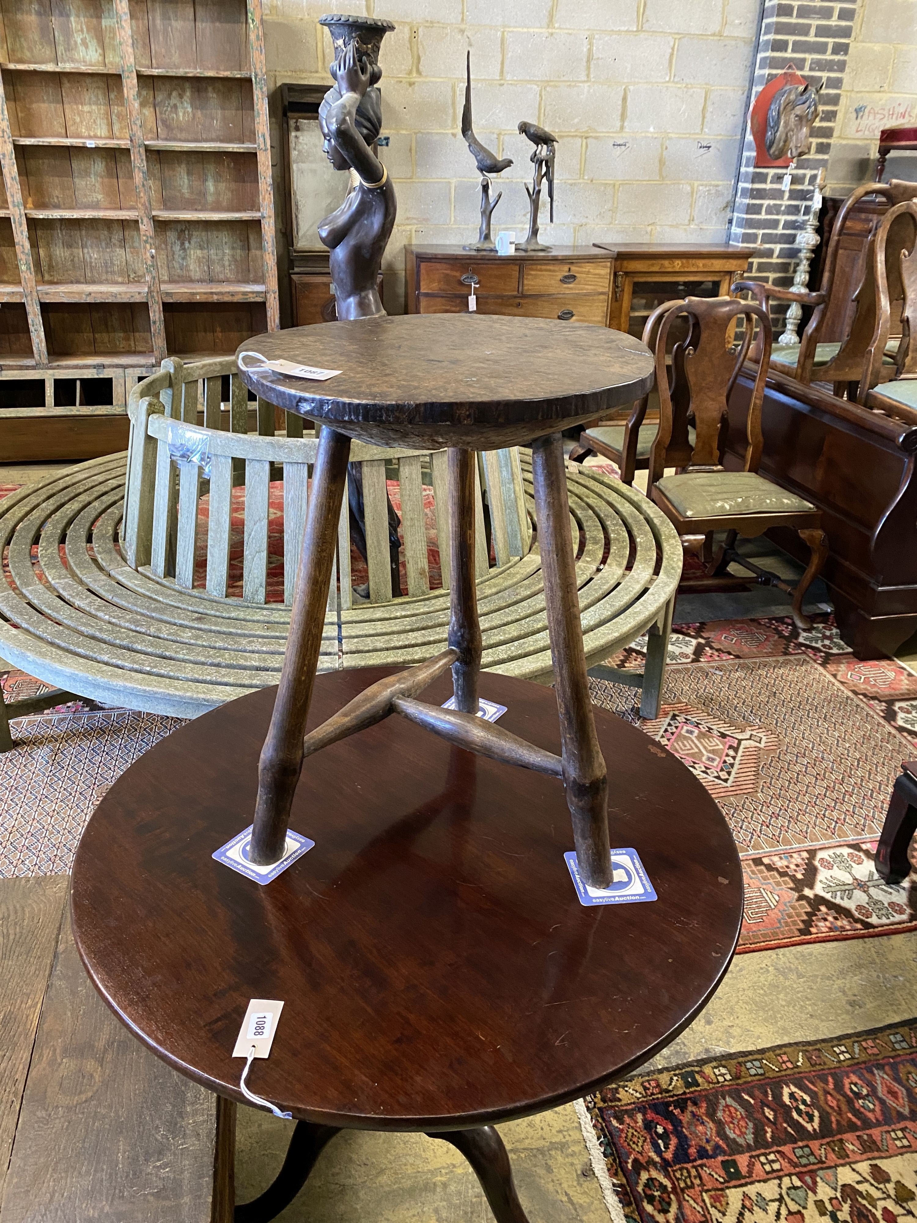 A late 18th / early 19th century circular burr elm and ash cricket table, diameter 60cm, height 62cm